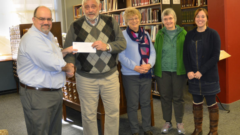 (l-r): RIHS Deputy Executive Director for Collections & Interpretation Richard J. Ring receives a grant check from Russell DeSimone of the Heritage Harbor Foundation at the Robinson Research Center on Thursday, Jan. 31, 2019, along with RIHS committee member Jane Lancaster, trustee Mary Speare, and committee member Charlotte Carrington-Farmer. Photo by J.D. Kay.
